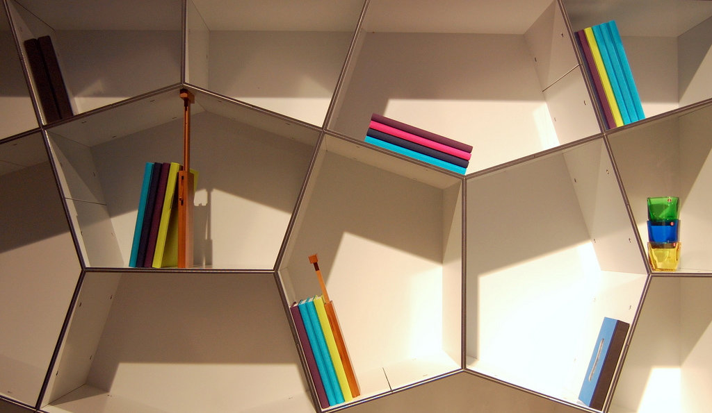 a bookshelf made up pf abstarct shapes